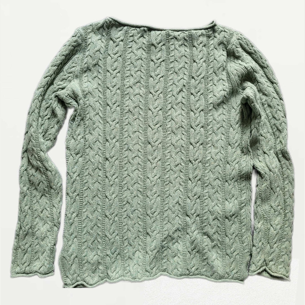 Pull torsadé vert pastel, taille non précisée, sans marque visible. Fripes Sélect