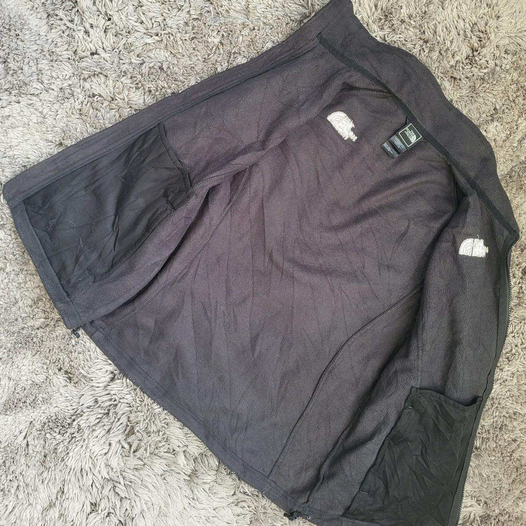 Veste polaire noire femme The North Face taille S, logo visible, Fripes Sélect