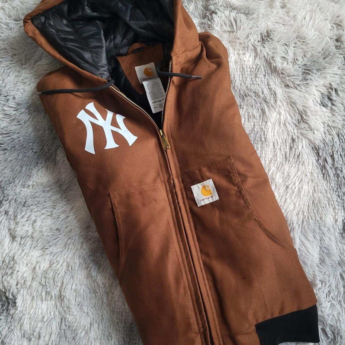 Manteau Carhartt marron pour homme taille L, capuche, logo blanc. Fripes Sélect