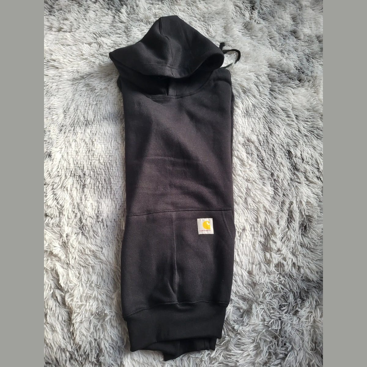 Sweat à capuche Carhartt noir, taille XL, logo visible. Fripes Sélect