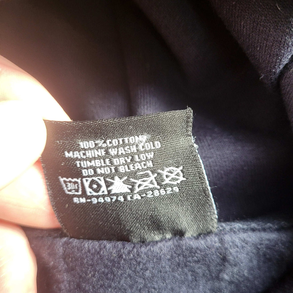 Sweat bleu Stussy taille S, étiquette textile visible, Fripes Sélect