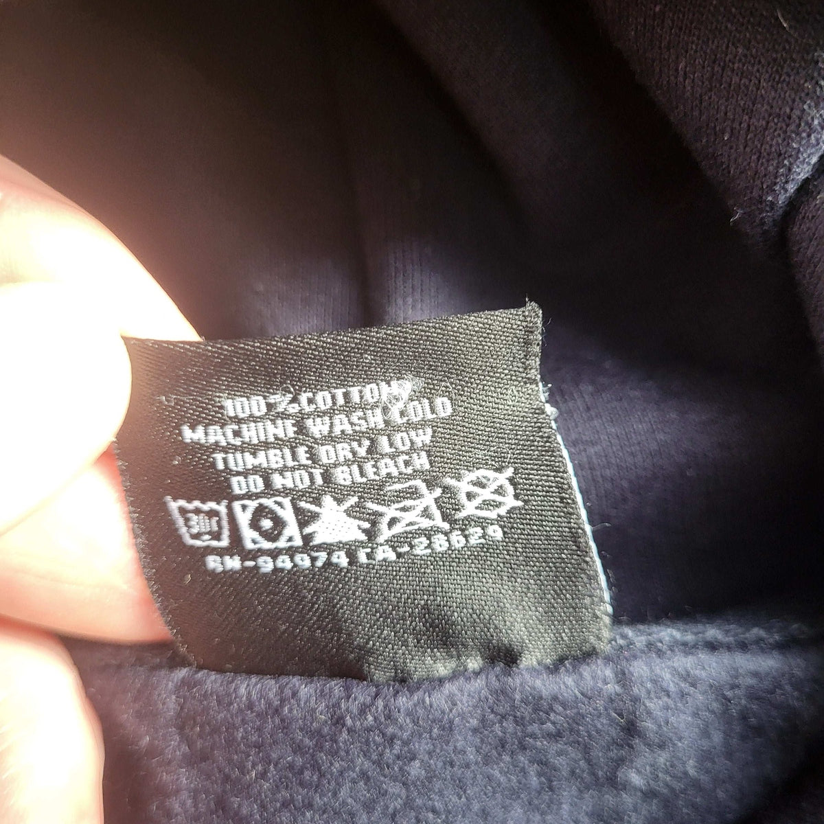 Sweat bleu Stussy taille S, étiquette textile visible, Fripes Sélect