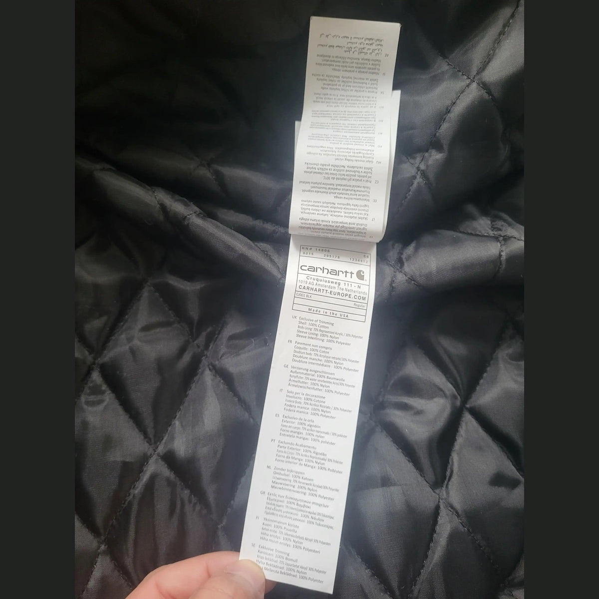 Étiquette d'une veste Carhartt brune taille L, présentation intérieure. Fripes Sélect