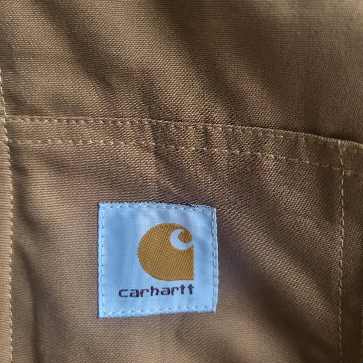 Veste Carhartt brune taille L, étiquette visible, Fripes Sélect