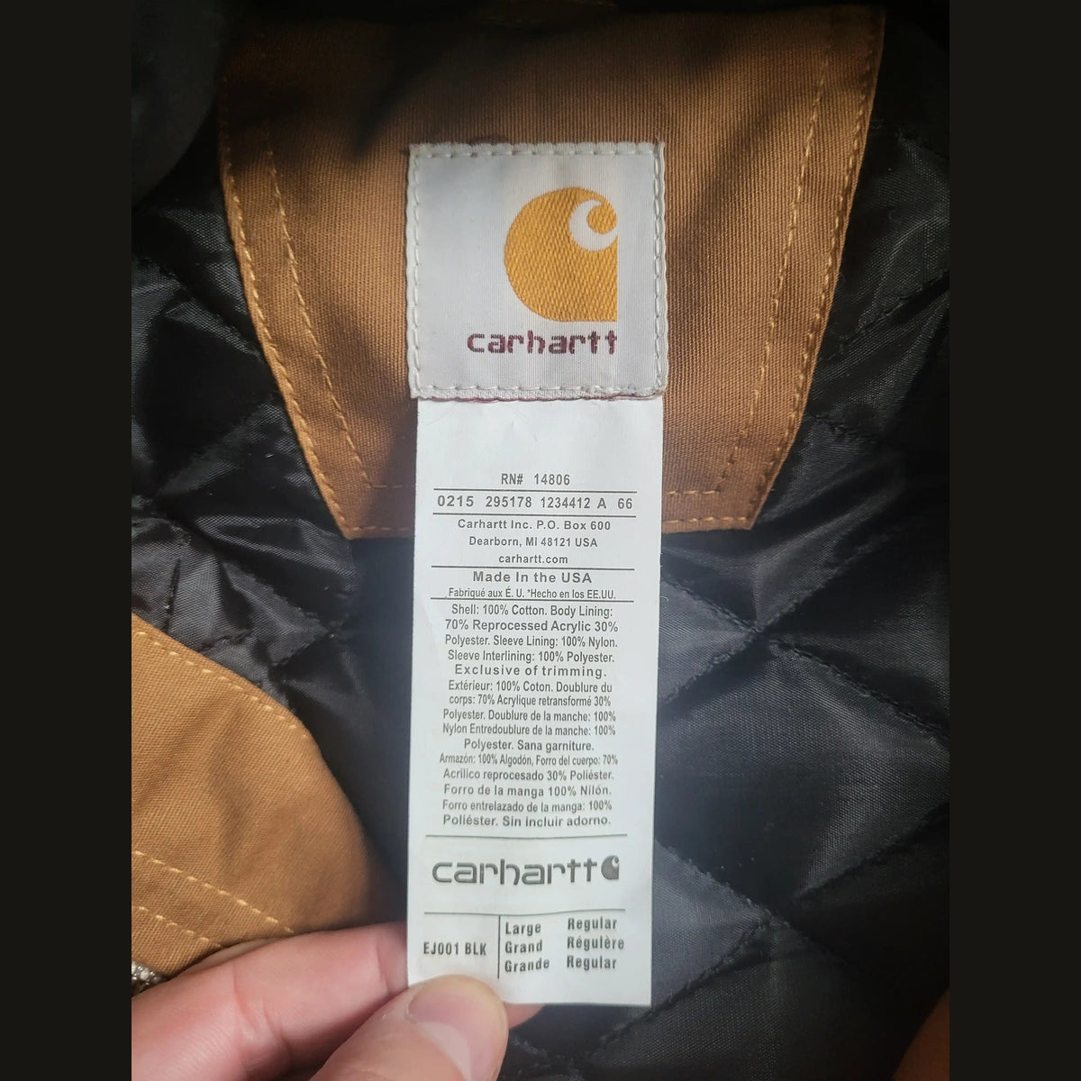 Veste Carhartt brune taille L, étiquette visible. Fripes Sélect