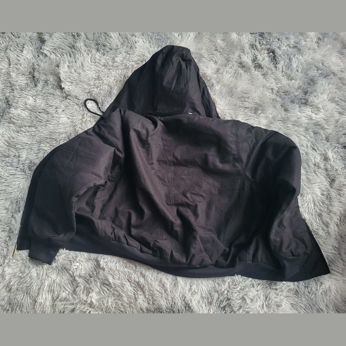Veste noire à capuche Carhartt taille L, vue de dos, Fripes Sélect