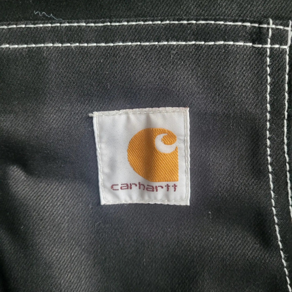 Veste Carhartt noire, taille M, étiquette visible, Fripes Sélect
