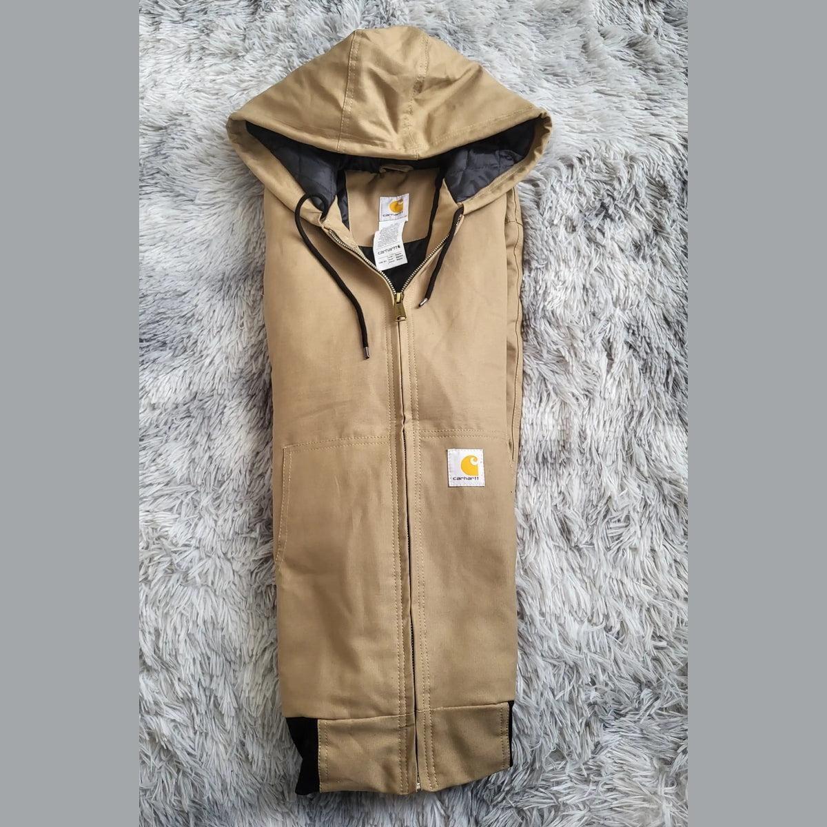 Veste à capuche Carhartt beige taille L, étiquette visible. Fripes Sélect