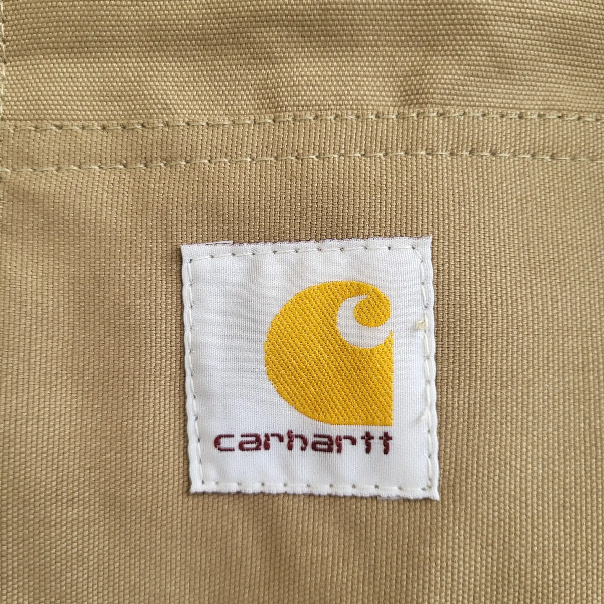 Veste Carhartt beige, logo visible, taille L. Fripes Sélect