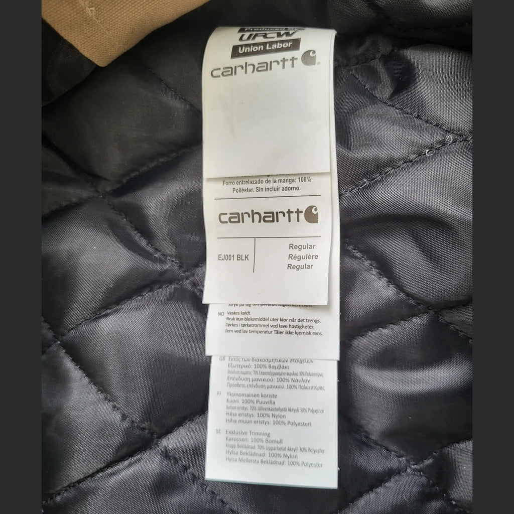Étiquette d'une veste Carhartt beige, taille L, Fripes Sélect