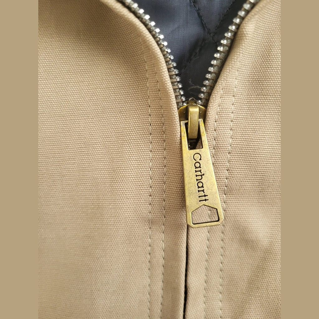 Veste Carhartt beige, fermeture éclair visible, taille L. Fripes Sélect