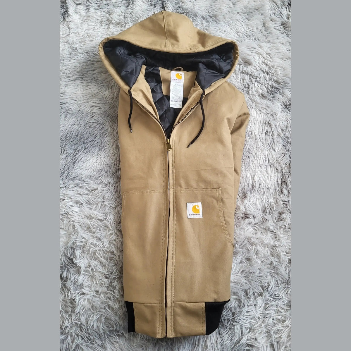 Veste à capuche Carhartt beige taille XL, logo visible. Fripes Sélect