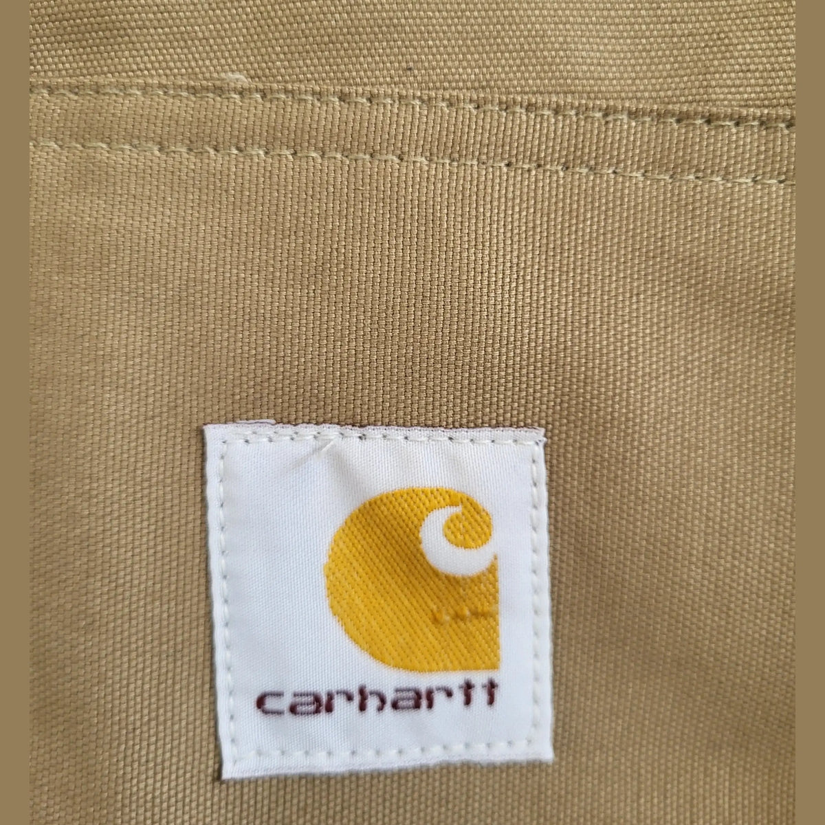 Veste Carhartt beige, logo visible, taille XL. Fripes Sélect