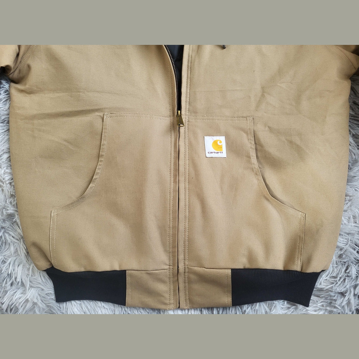 Veste Carhartt beige à capuche, taille XL, avec poches avant. Fripes Sélect