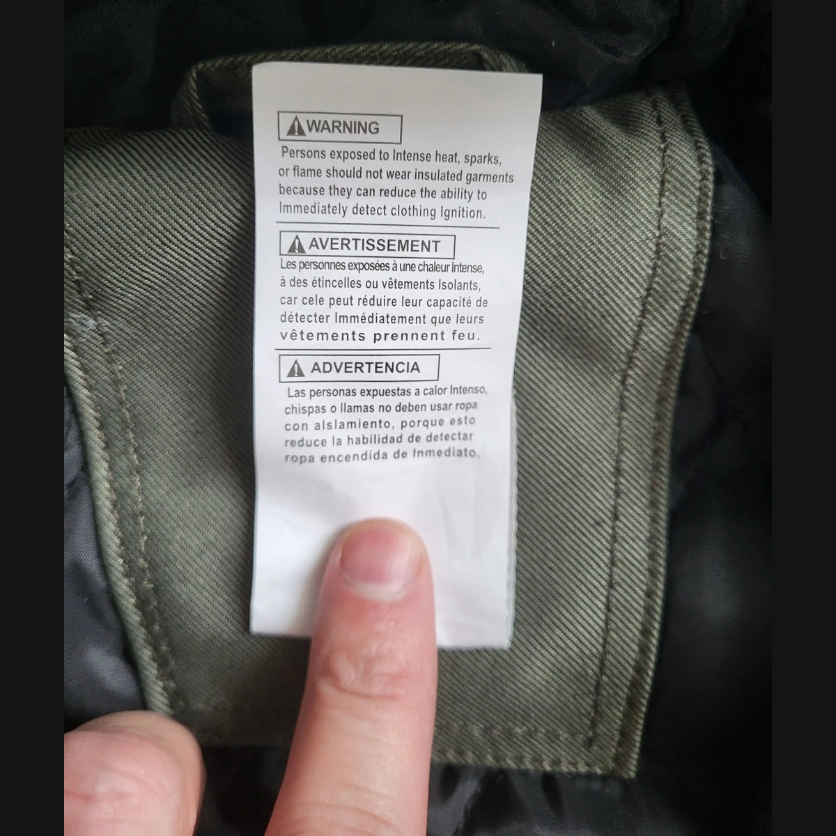Veste Carhartt kaki, taille XL, étiquette intérieure visible. Fripes Sélect