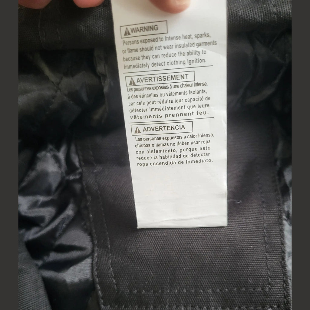 Veste noire Carhartt taille L, étiquette intérieure visible, Fripes Sélect