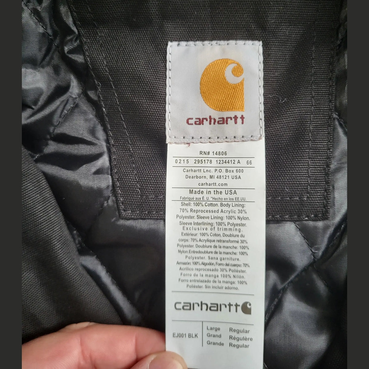 Veste Carhartt noire taille L, étiquette visible, Fripes Sélect