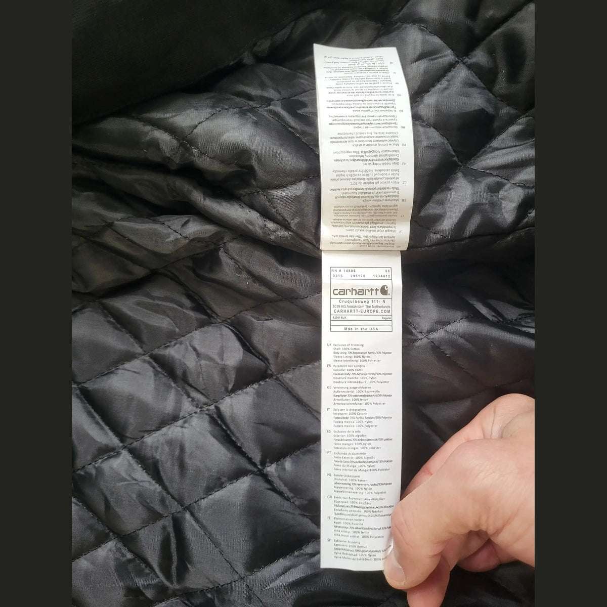 Veste Carhartt noire taille L, étiquette visible, Fripes Sélect