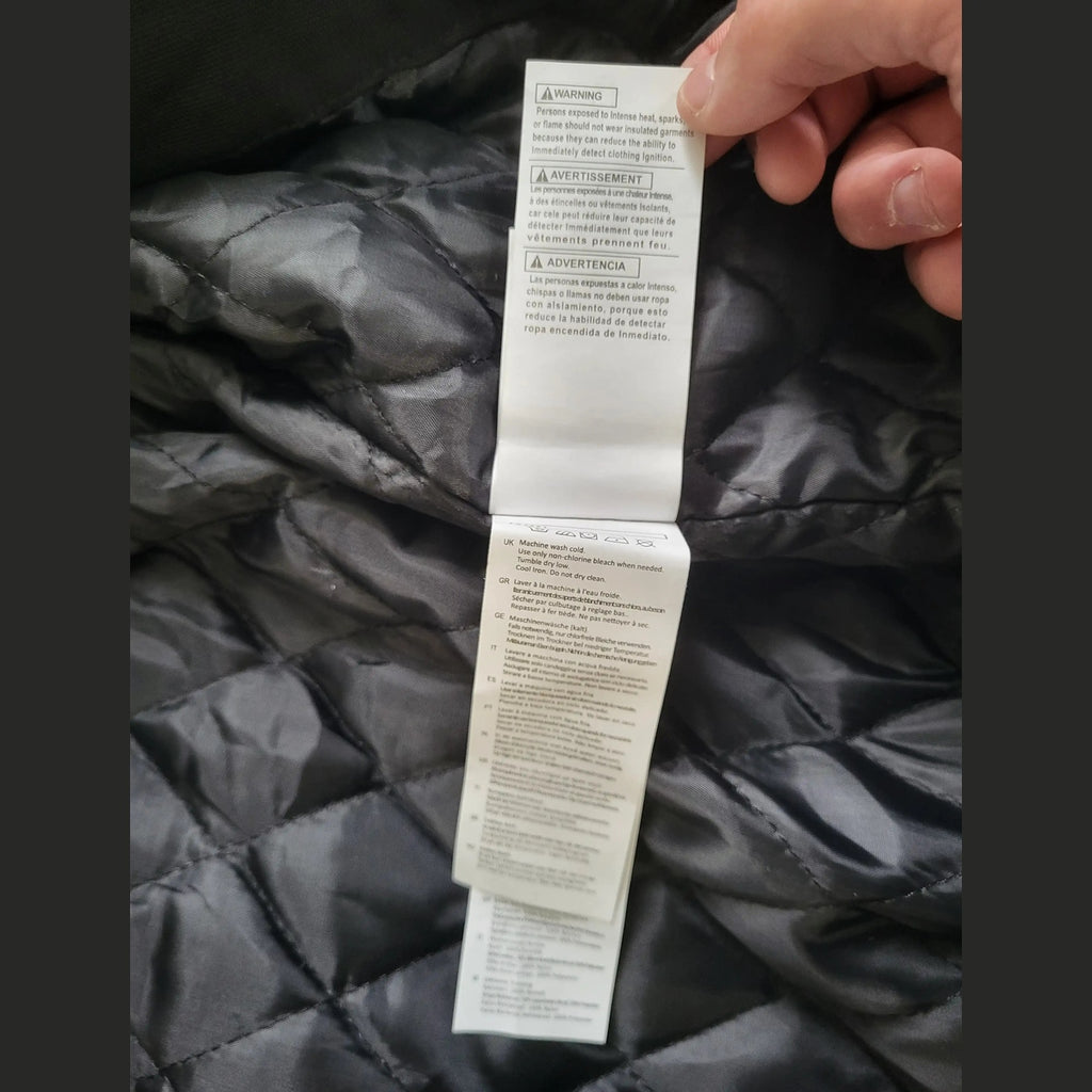Veste noire Carhartt taille L, étiquette visible, Fripes Sélect