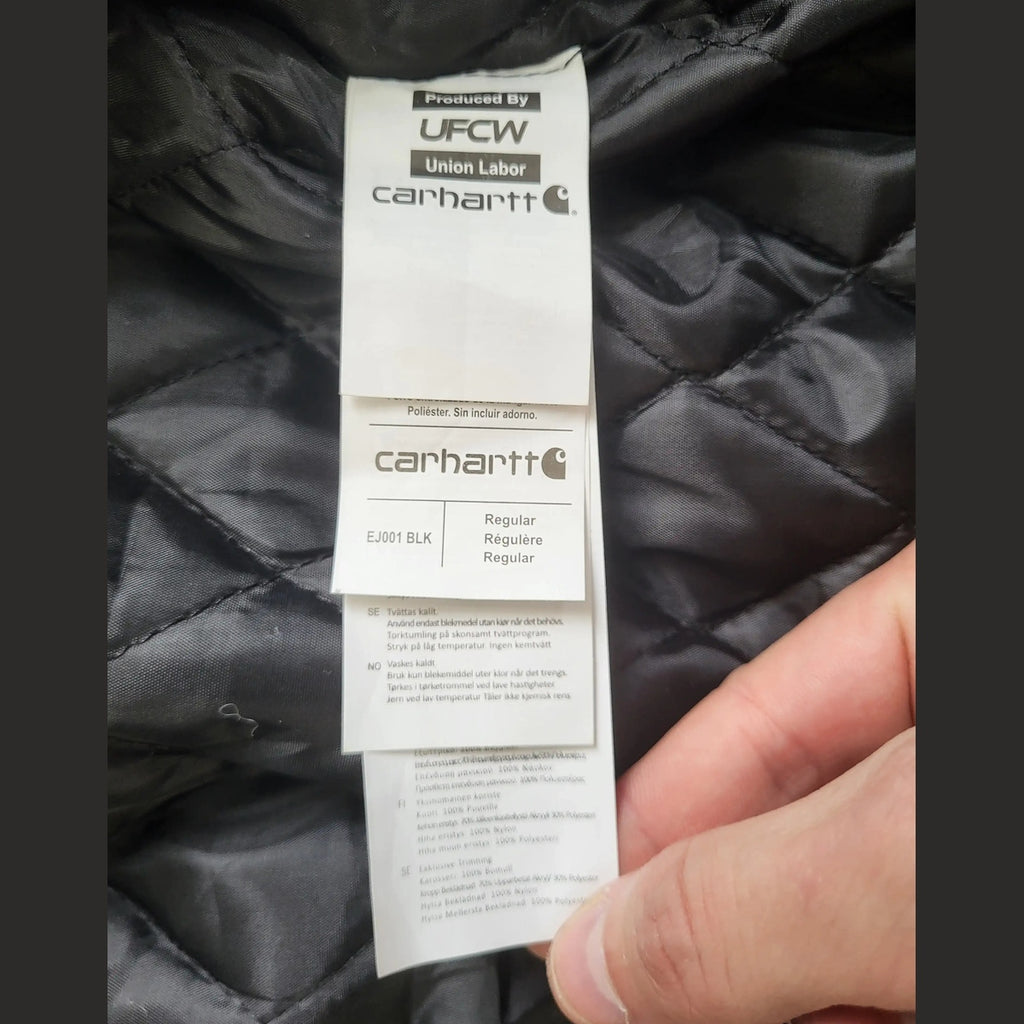 Veste noire Carhartt taille S, étiquette intérieure visible, Fripes Sélect
