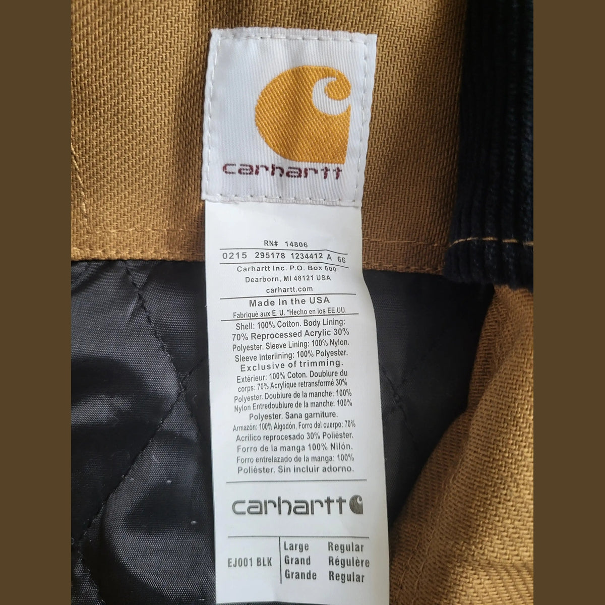Veste Carhartt marron taille L, étiquette visible. Fripes Sélect