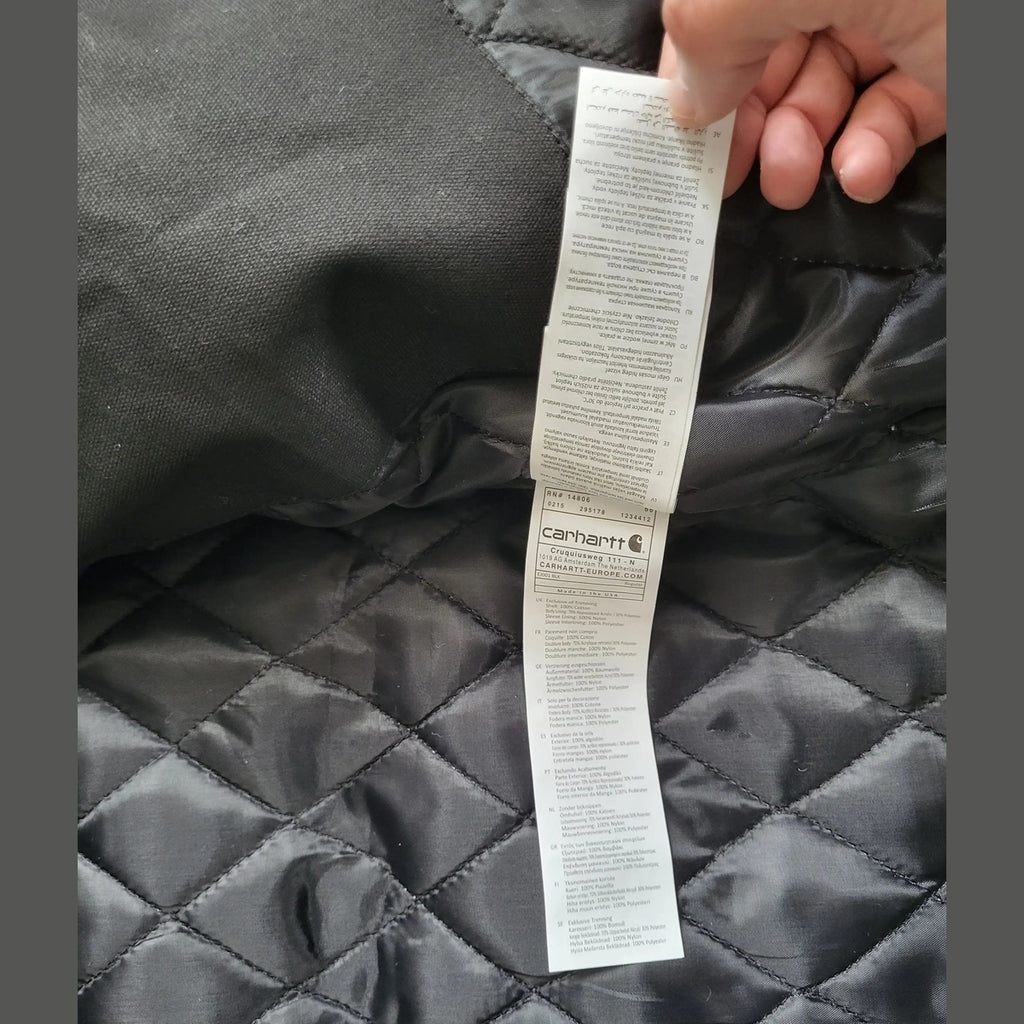 Veste Carhartt noire, taille M, étiquette visible, Fripes Sélect