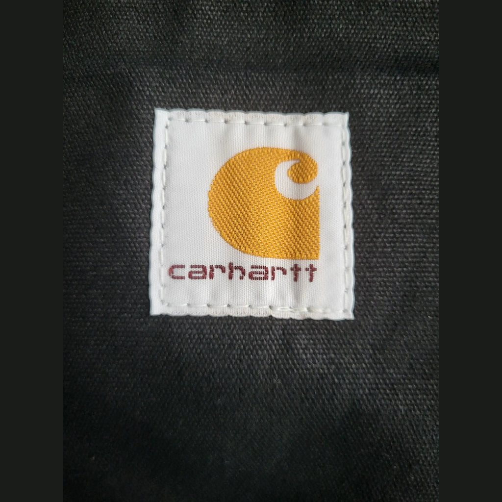 Veste Carhartt noire taille M, étiquette logo visible. Fripes Sélect