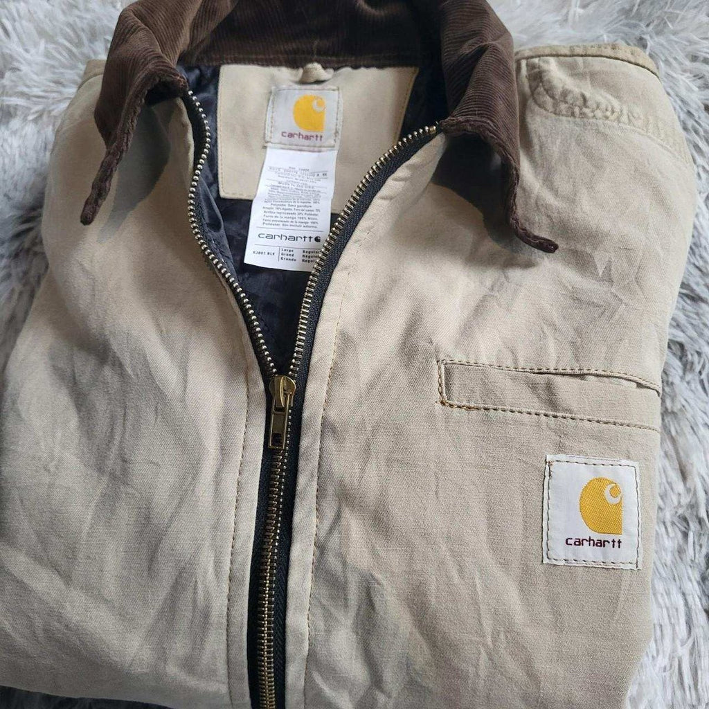 Veste beige Carhartt taille L, col marron, logo visible. Fripes Sélect