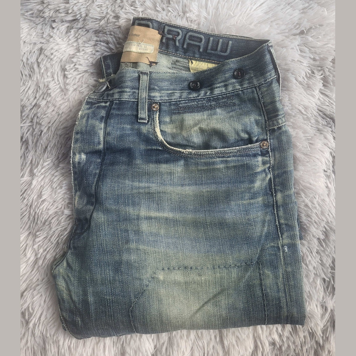 Jean bleu délavé G-Star RAW, taille 30. Fripes Sélect