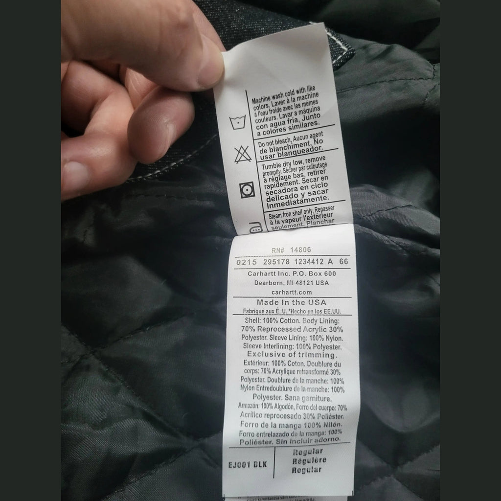 Veste Carhartt noire taille Regular, étiquette intérieure visible. Fripes Sélect