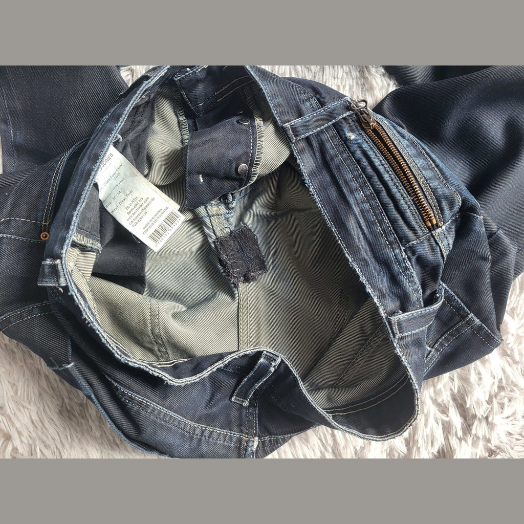 Jean bleu JACK & JONES, taille W33 L32, visible sur l’étiquette. Fripes Sélect