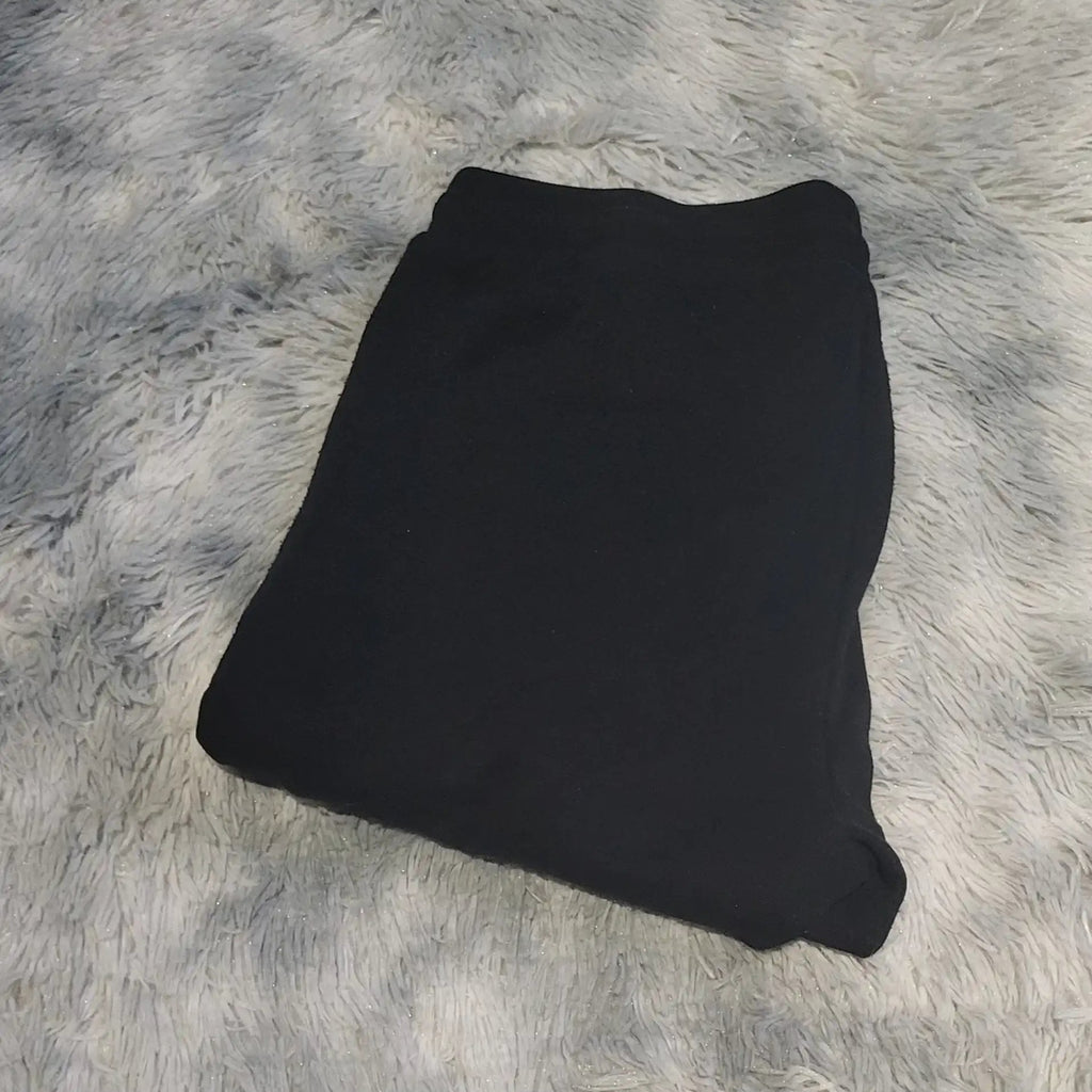 Pantalon noir, marque non visible, taille non précisée. Fripes Sélect