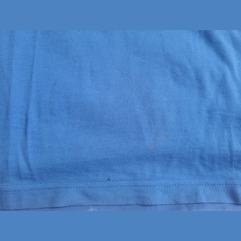T-shirt bleu uni, marque et taille non visibles, Fripes Sélect