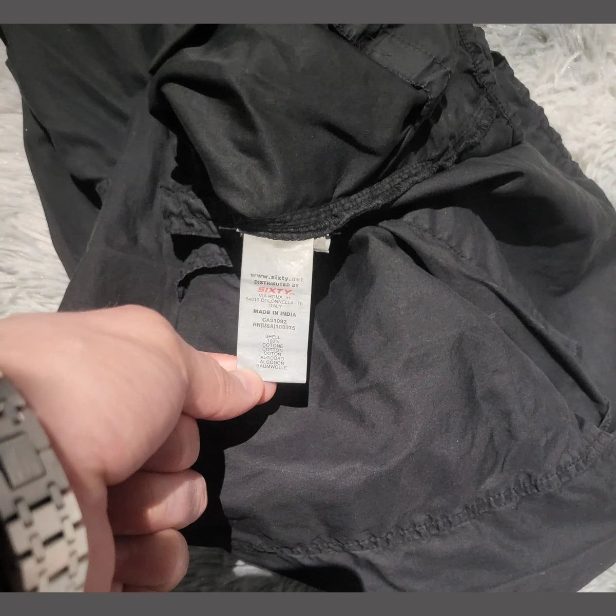 Pantalon noir YXYTE, taille non visible, étiquette montrée Fripes Sélect