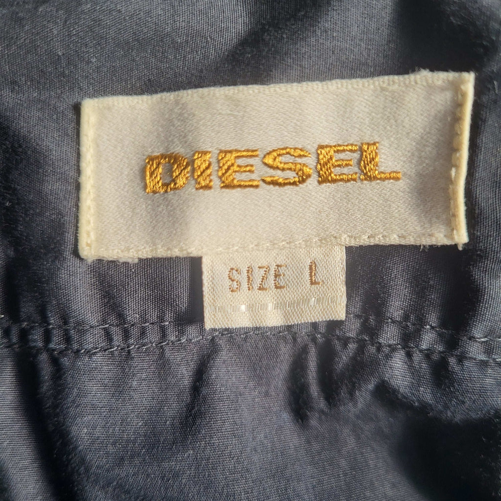 Veste noire Diesel taille L, étiquette visible. Fripes Sélect