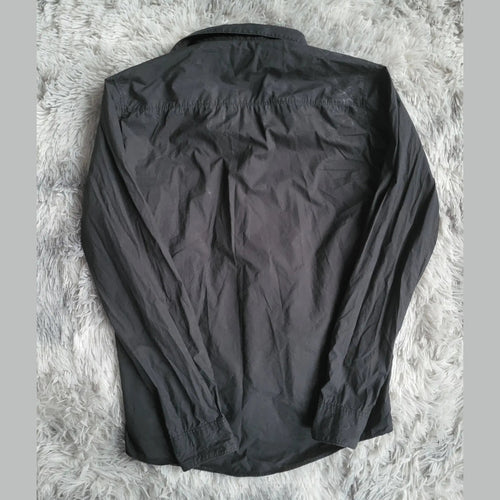 Chemise noire manches longues, marque non visible, taille non indiquée, Fripes Sélect