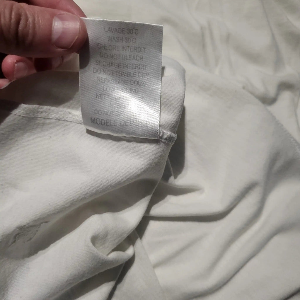 T-shirt blanc sans marque visible, taille non indiquée, Fripes Sélect