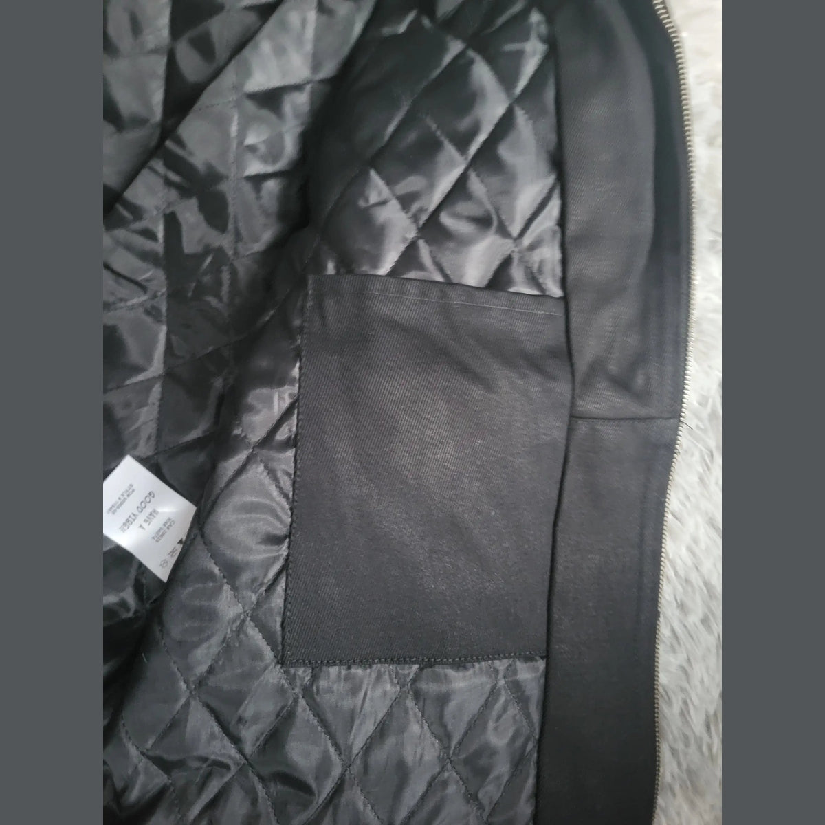 Veste matelassée noire, taille M, marque Good Year visible, Fripes Sélect