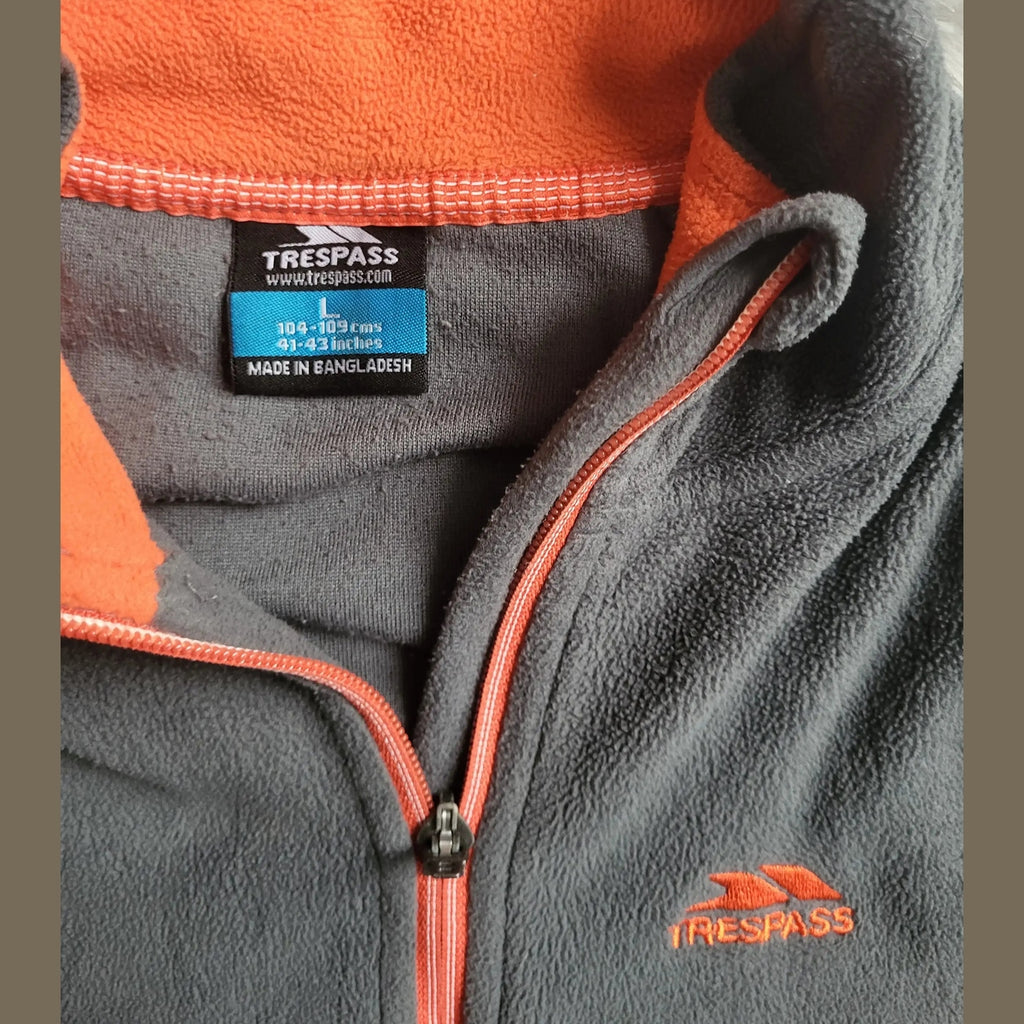 Veste polaire Trespass grise et orange taille 10 ans Fripes Sélect