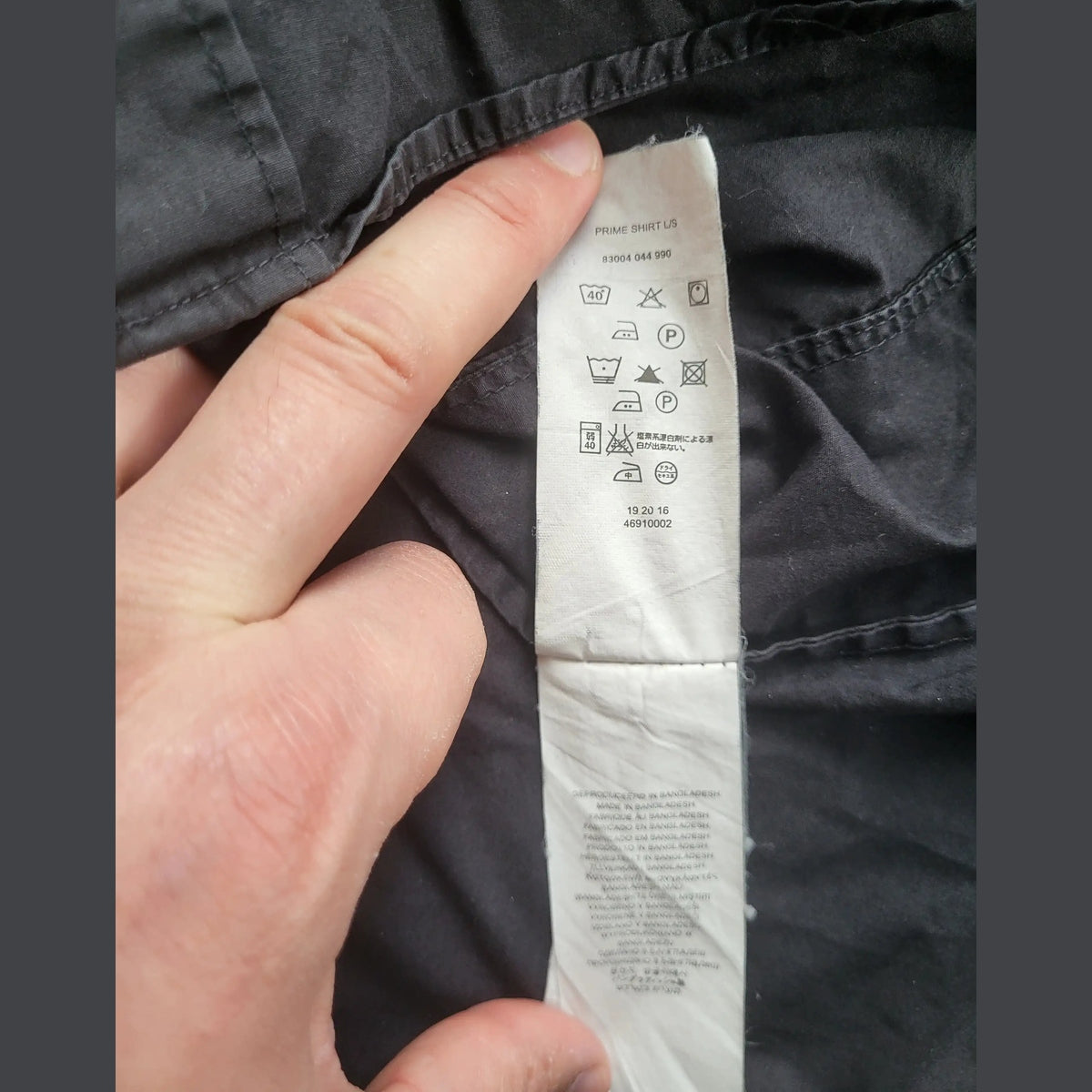 Chemise noire Prime Shirt US taille L, étiquette visible, Fripes Sélect