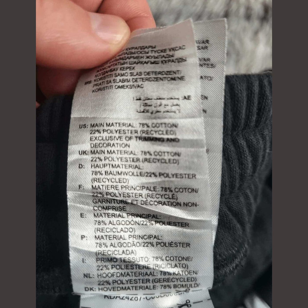 Étiquette de pantalon, marque non visible, noir, taille non précisée, Fripes Sélect
