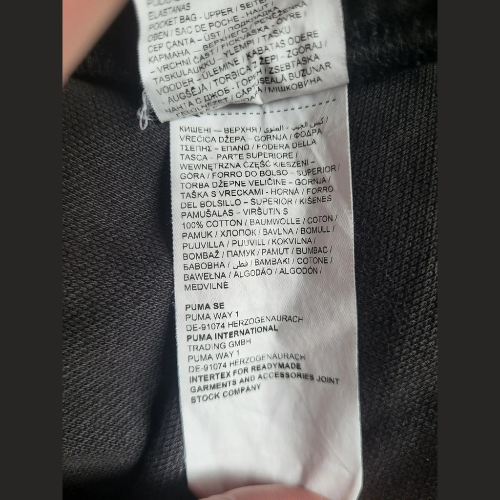 Pantalon Puma noir, taille non visible, 100% coton, étiquette d'origine Fripes Sélect