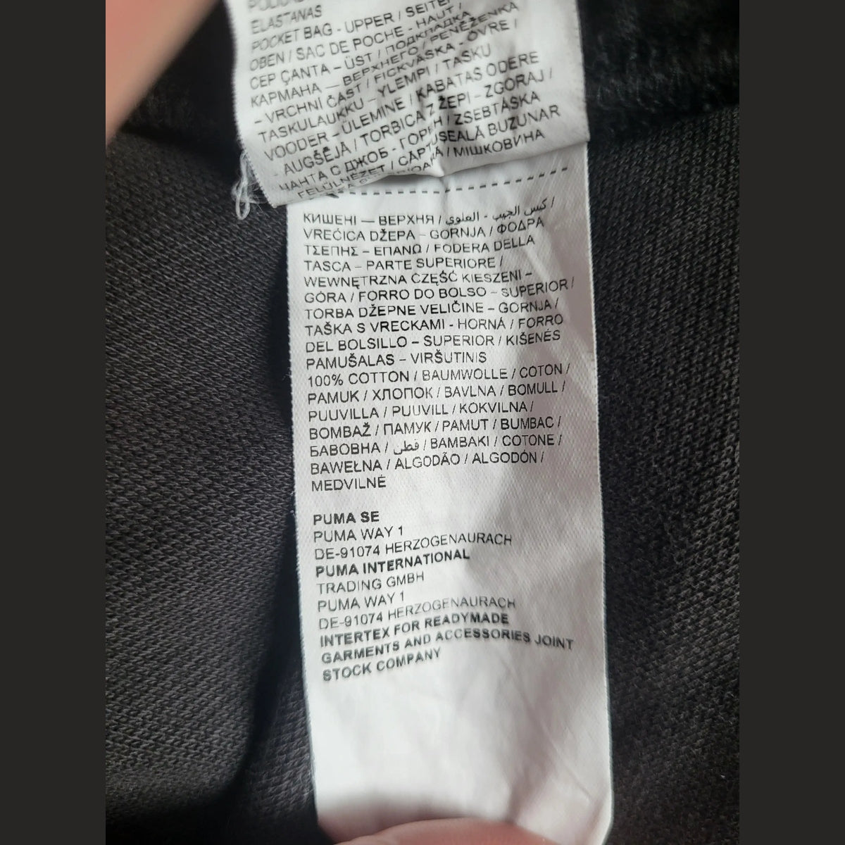 Pantalon Puma noir, taille non visible, 100% coton, étiquette d'origine Fripes Sélect