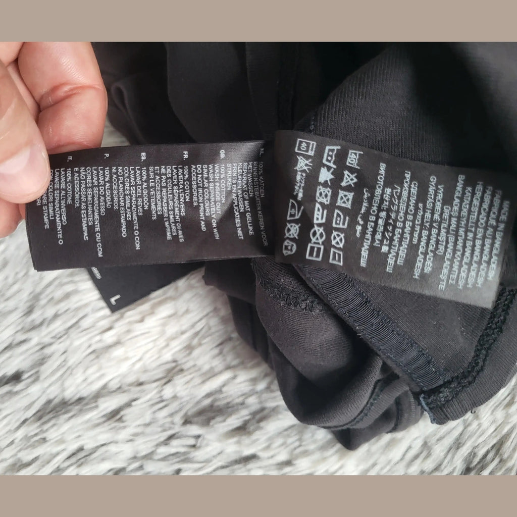 T-shirt noir taille L, marque non visible, étiquette de composition, Fripes Sélect