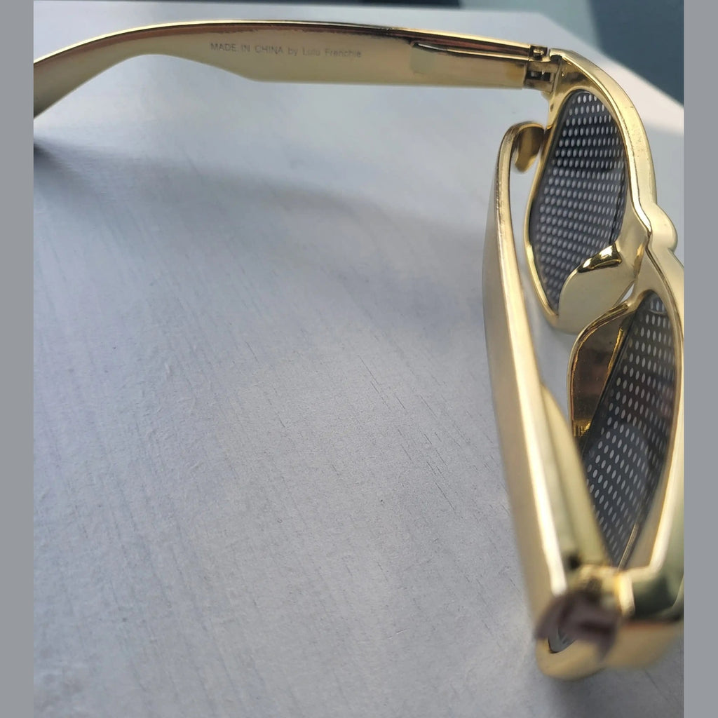 Lunettes de soleil Lulu Frenchie dorées, verres à pois, taille unique. Fripes Sélect
