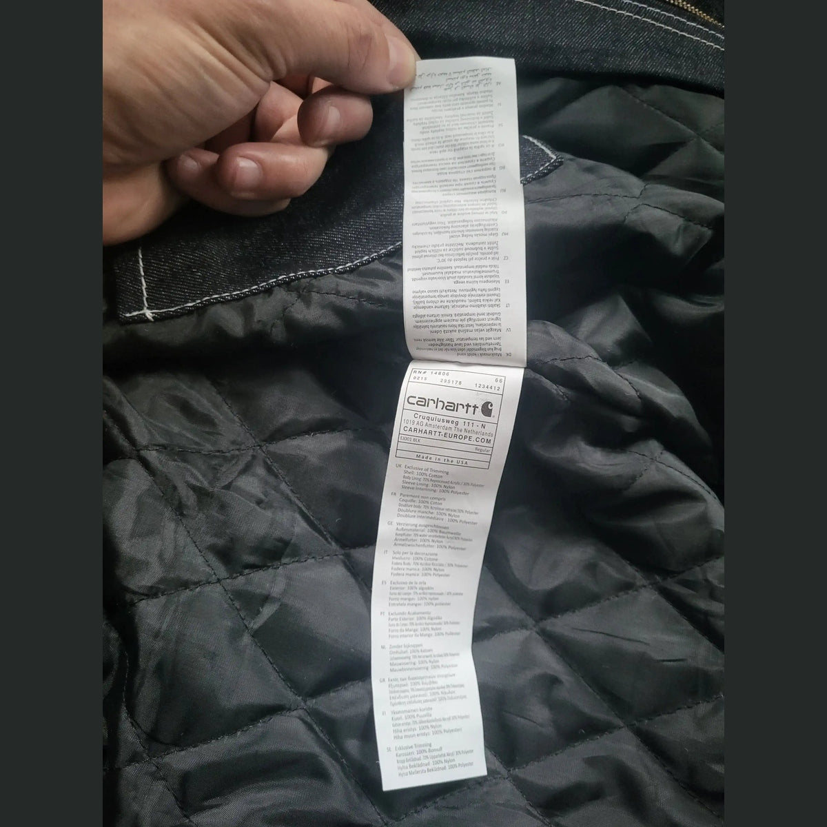 Veste Carhartt noire taille L, étiquette visible, Fripes Sélect