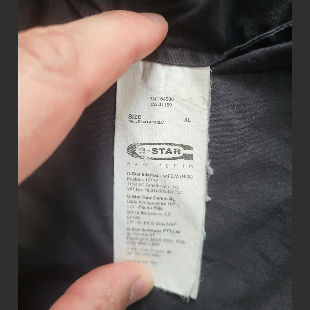Veste G-Star noire, taille XL, étiquette visible. Fripes Sélect