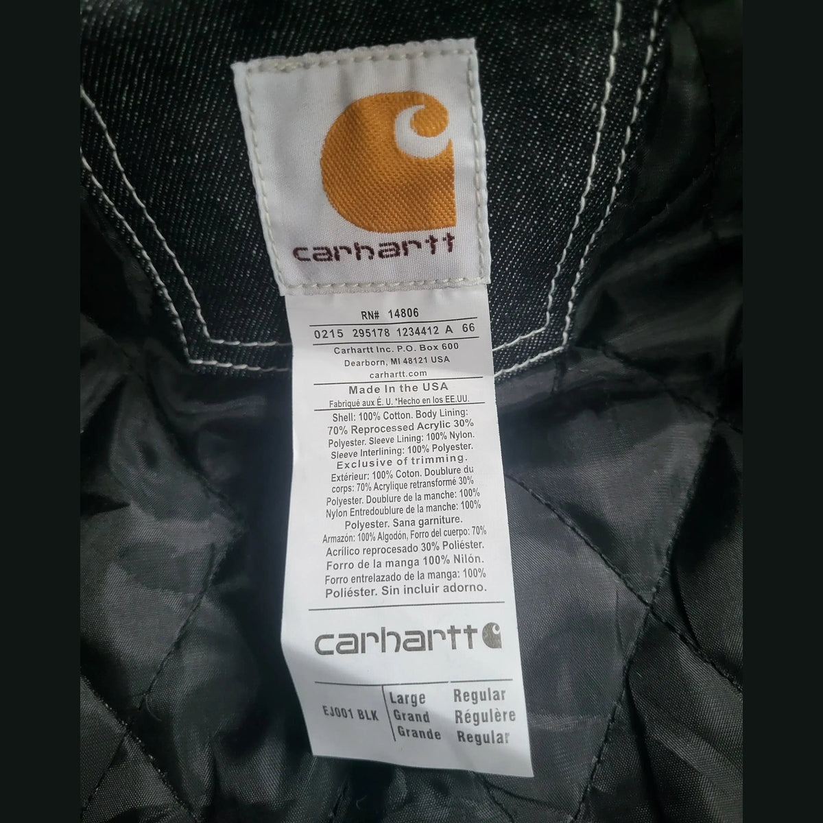 Veste Carhartt noire taille Large, coupe Regular, étiquette textile visible. Fripes Sélect