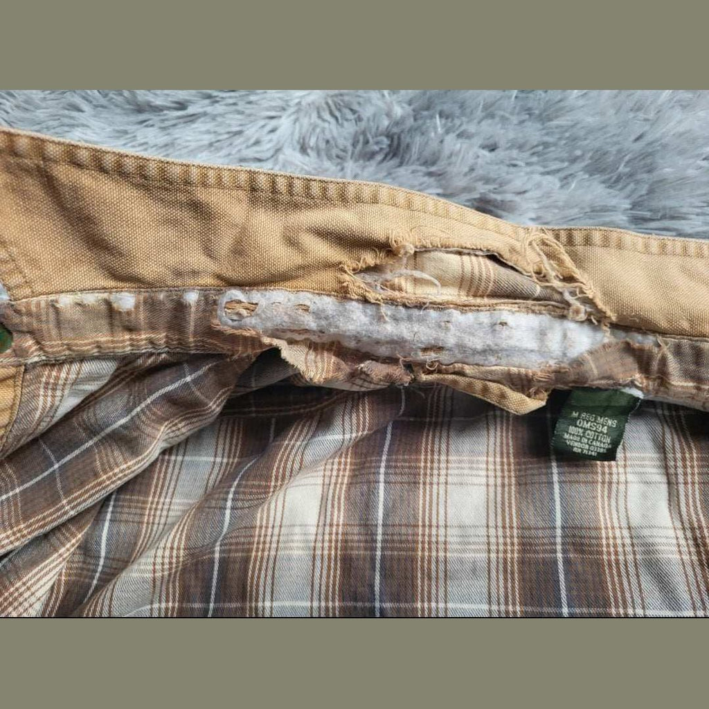 Veste à carreaux marrons taille M, marque non visible, doublure abîmée. Fripes Sélect