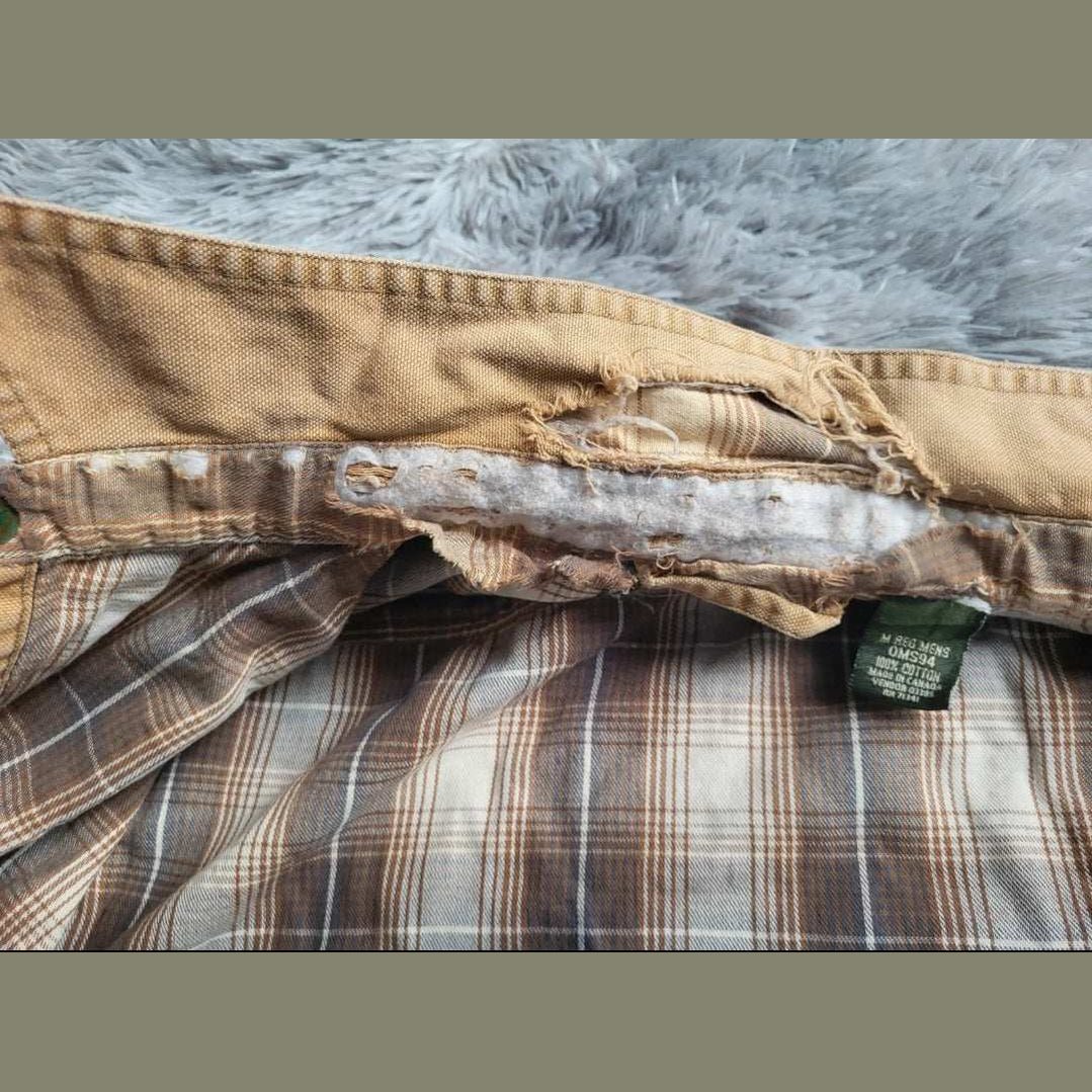 Veste à carreaux marrons taille M, marque non visible, doublure abîmée. Fripes Sélect